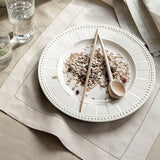 florence napkin & placemat by alexandre turpault on adorn.house