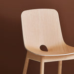 mono dining chair - white pigmented oak by woud at adorn.house