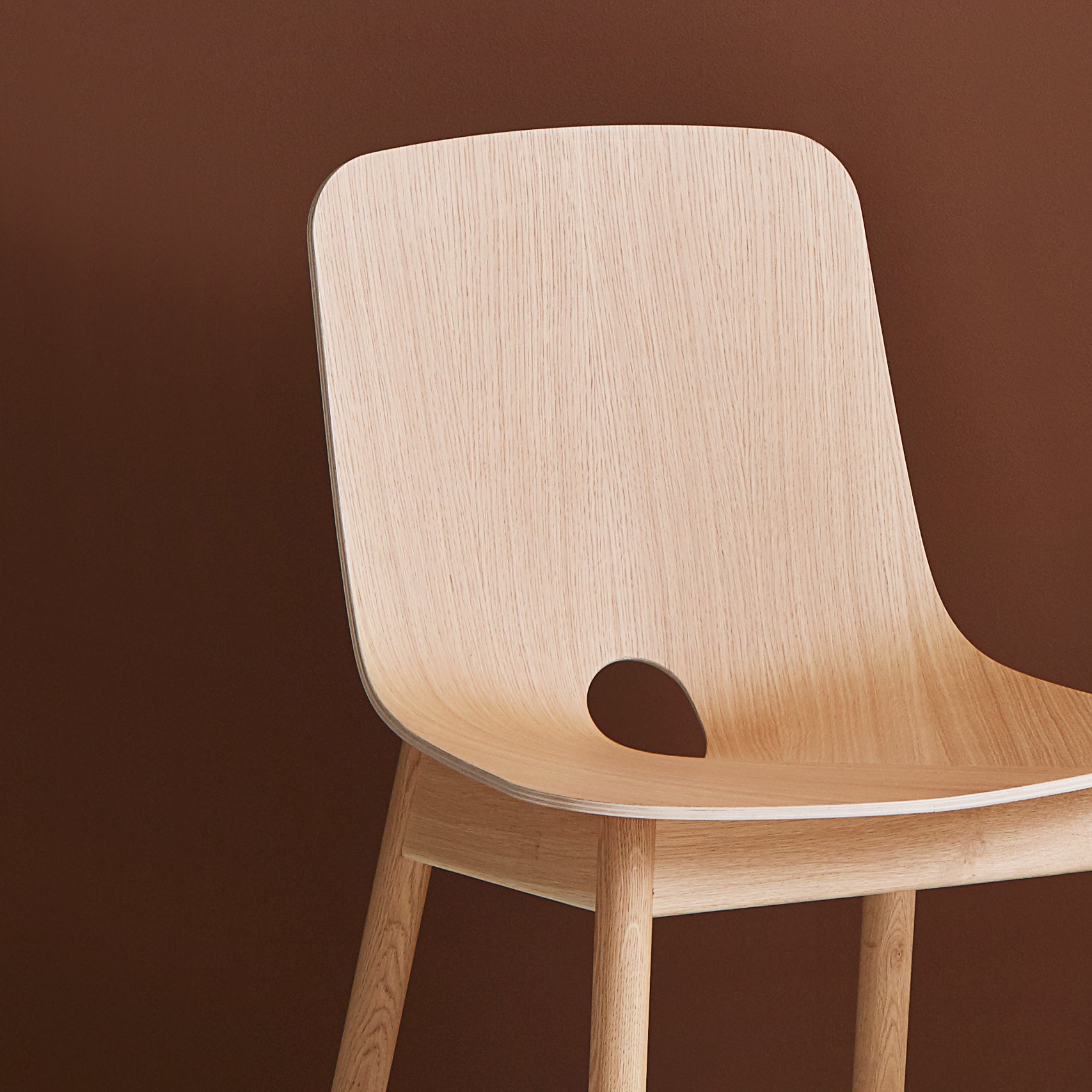 mono dining chair - white pigmented oak by woud at adorn.house