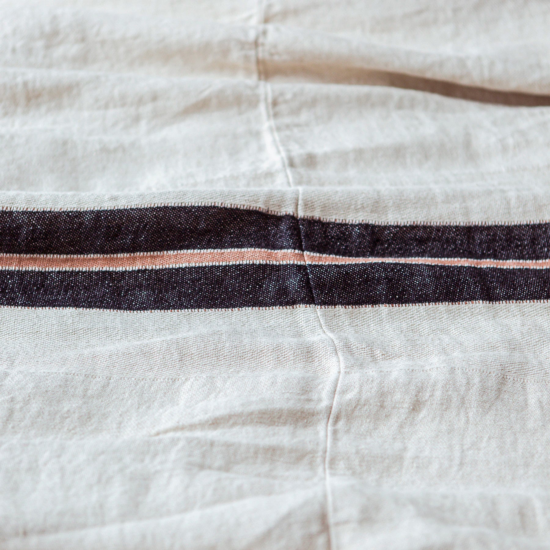 the patagonian stripe linen coverlet by libeco on adorn.house