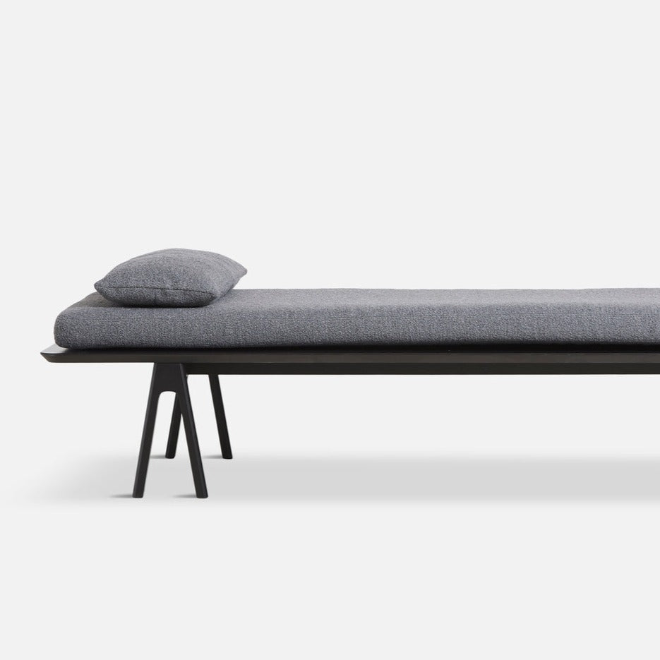level daybed grey bouclé & black by woud at adorn.house