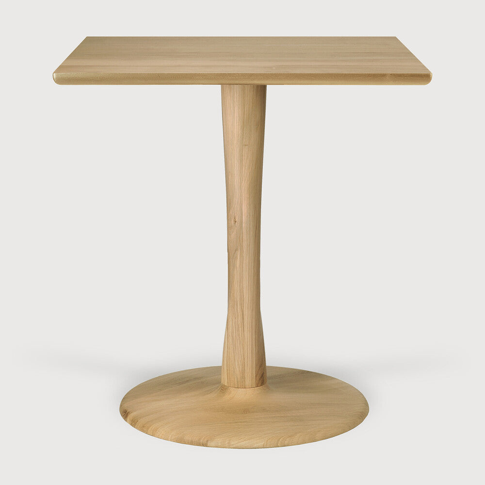 torsion dining table  by ethnicraft at adorn.house 
