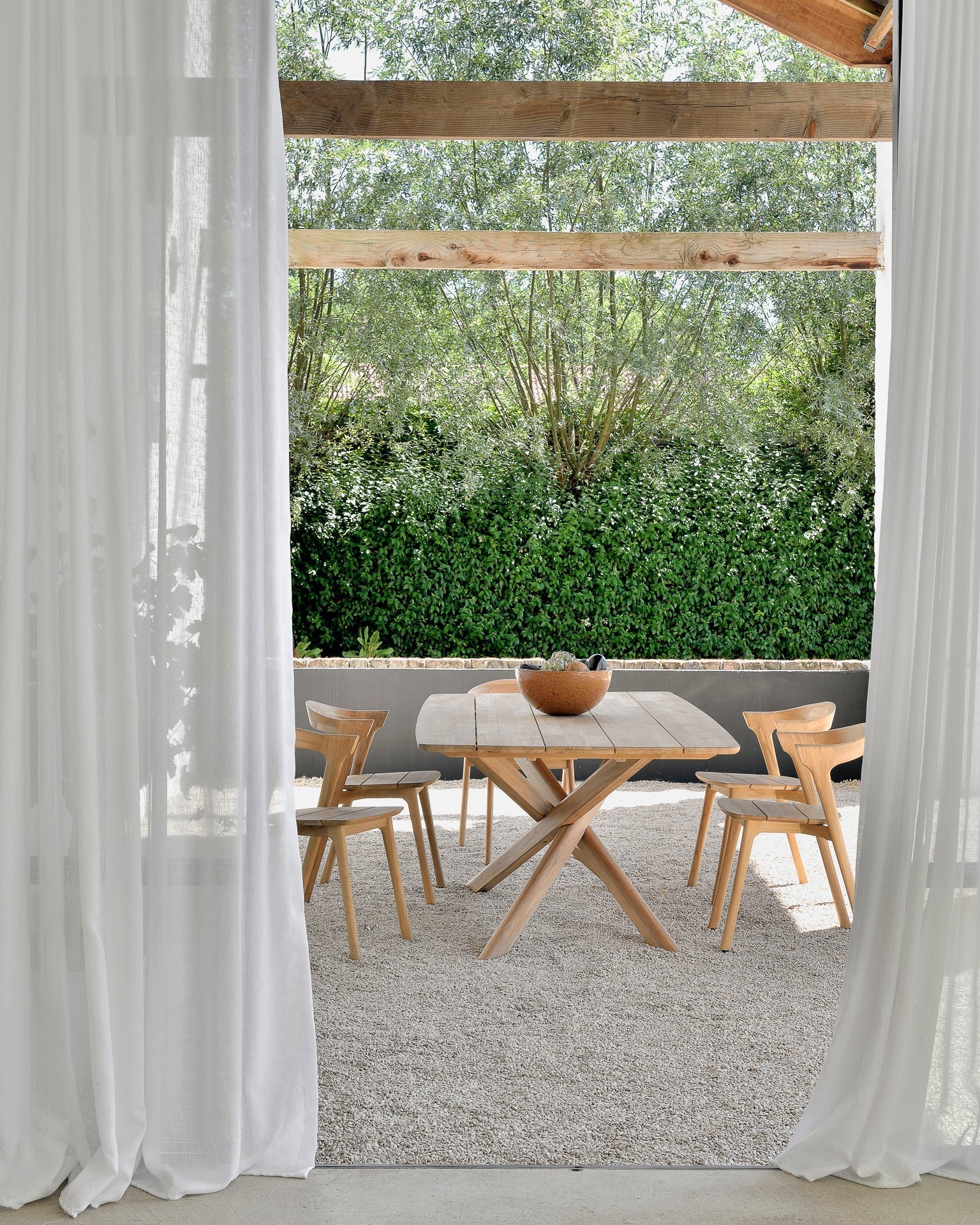 mikado outdoor dining table by ethnicraft at adorn.house