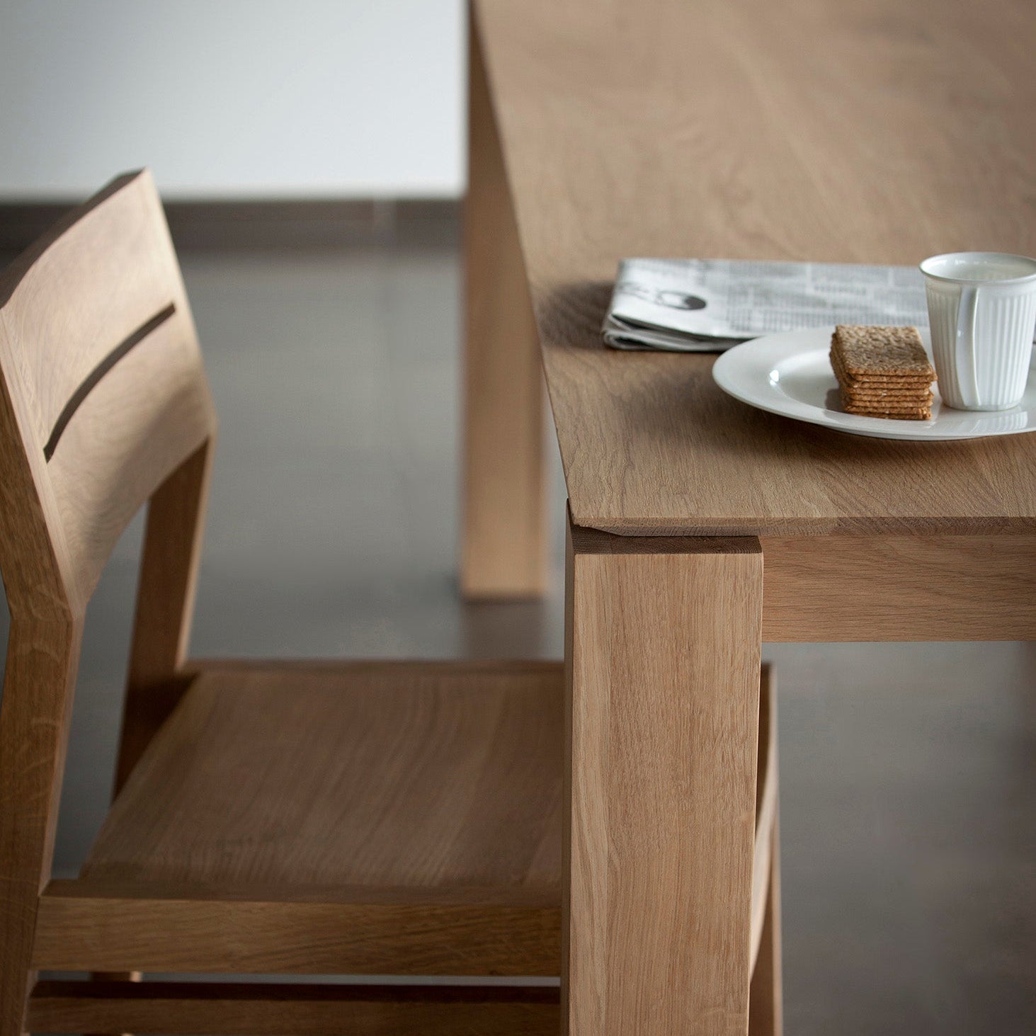slice dining table by ethnicraft at adorn.house