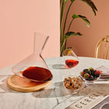 balance wine decanter with wooden base by nude at adorn.house