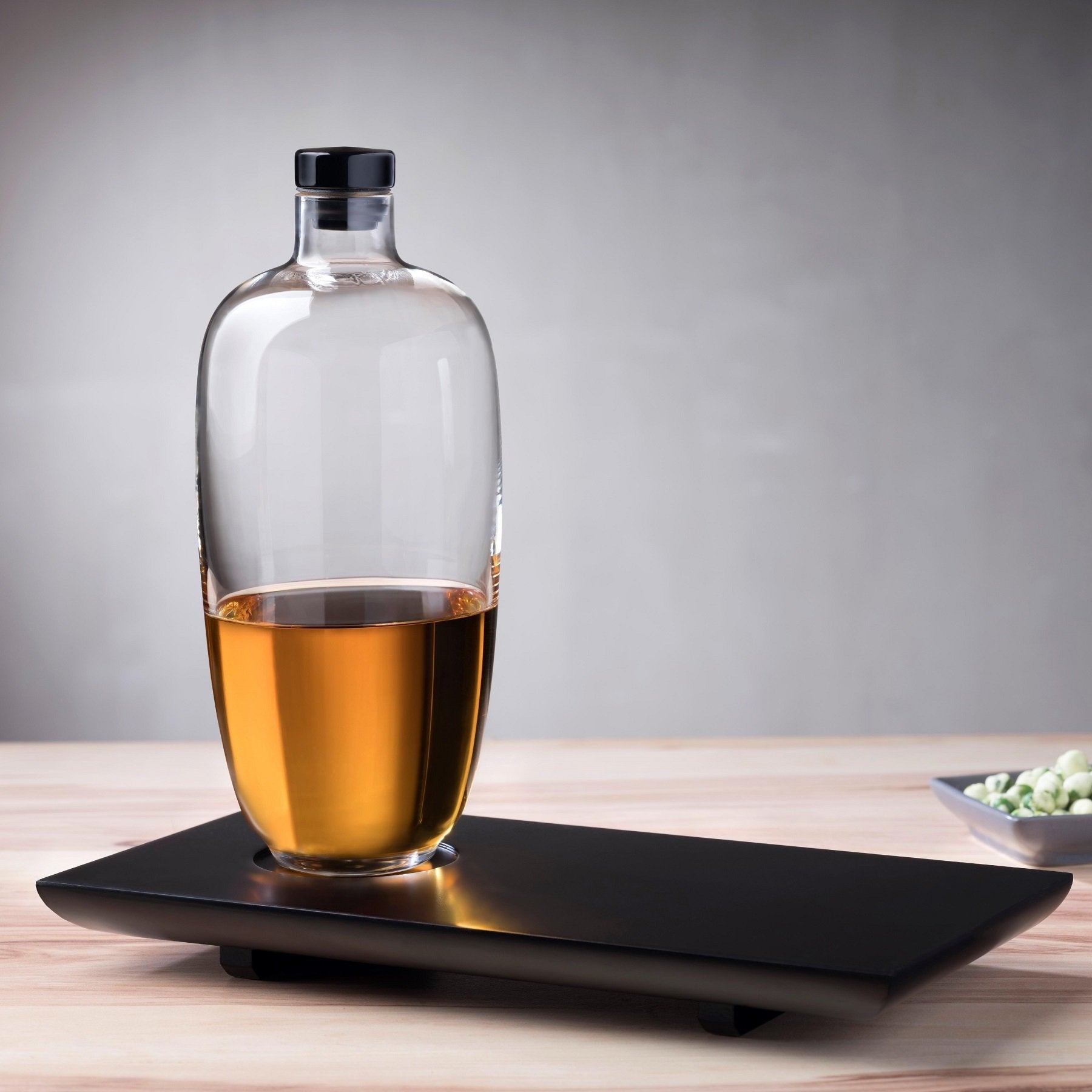 malt whisky bottle tall with wooden tray by nude at adorn.house