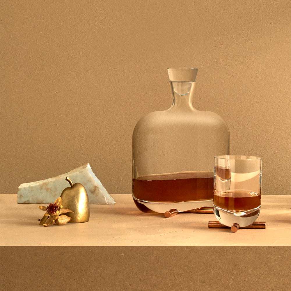 camp whisky bottle with brass base by nude at adorn.house