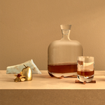camp whisky bottle with brass base by nude at adorn.house