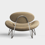 meadow lounge chair beige & brushed steel by woud at adorn.house