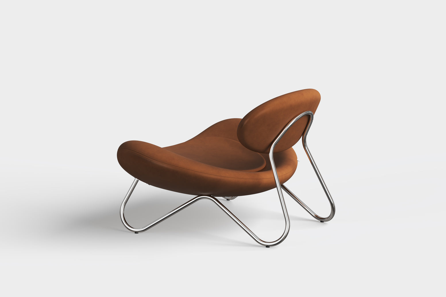 meadow lounge chair cognac leather & chrome by woud at adorn.house  Edit alt text