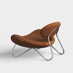 meadow lounge chair cognac leather & chrome by woud at adorn.house  Edit alt text