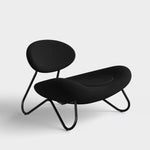 meadow lounge chair charcoal & black by woud at adorn.house