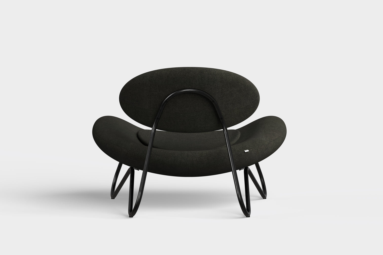 meadow lounge chair dark brown & black by woud at adorn.house  Edit alt text
