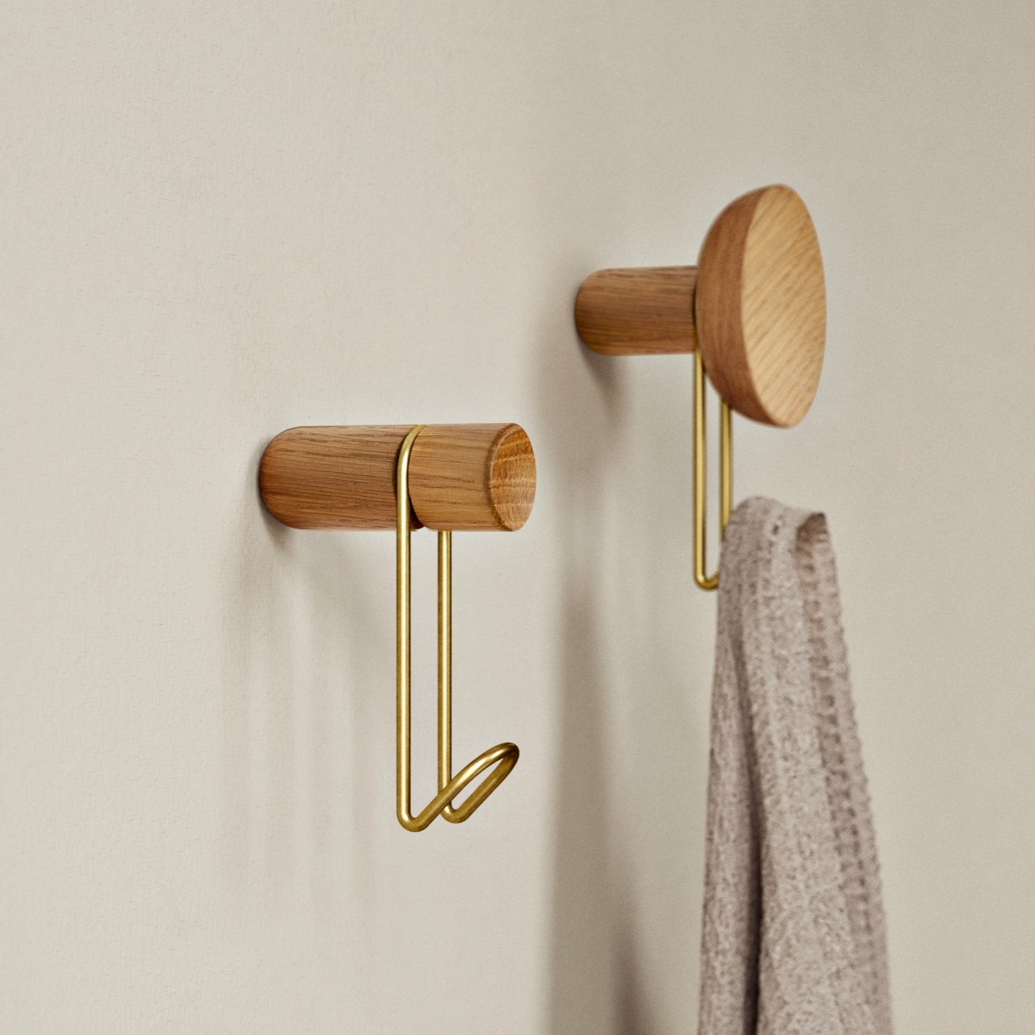 around wall hanger small oak & satin brass by woud at adorn.house